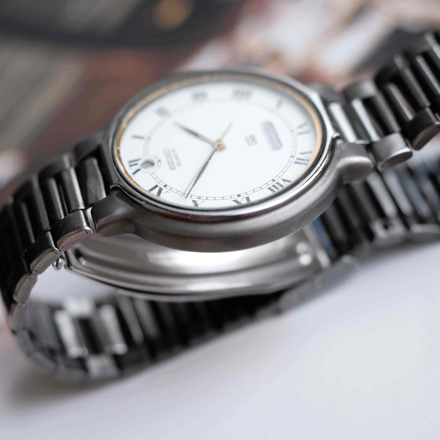 Vintage Seiko Dress Watch Black Coated White Roman Dial from the 80s