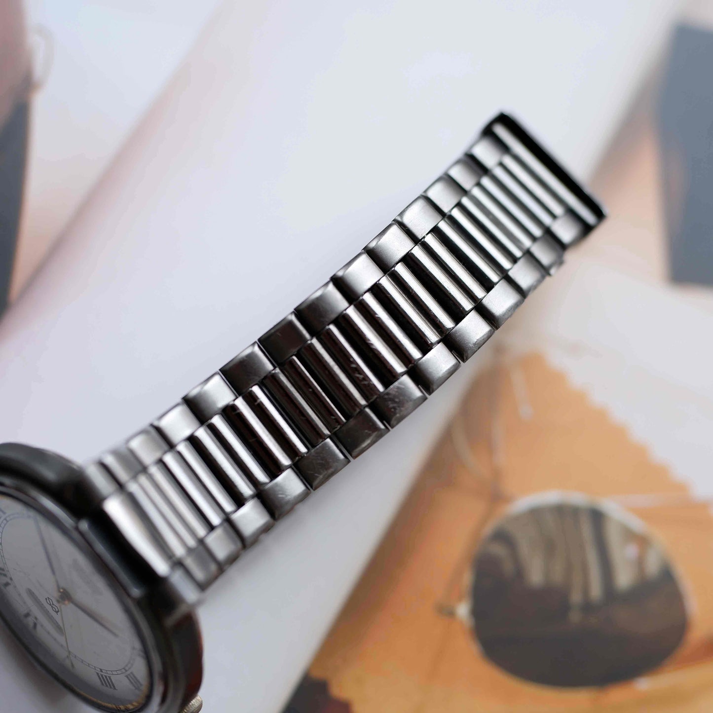 Vintage Seiko Dress Watch Black Coated White Roman Dial from the 80s