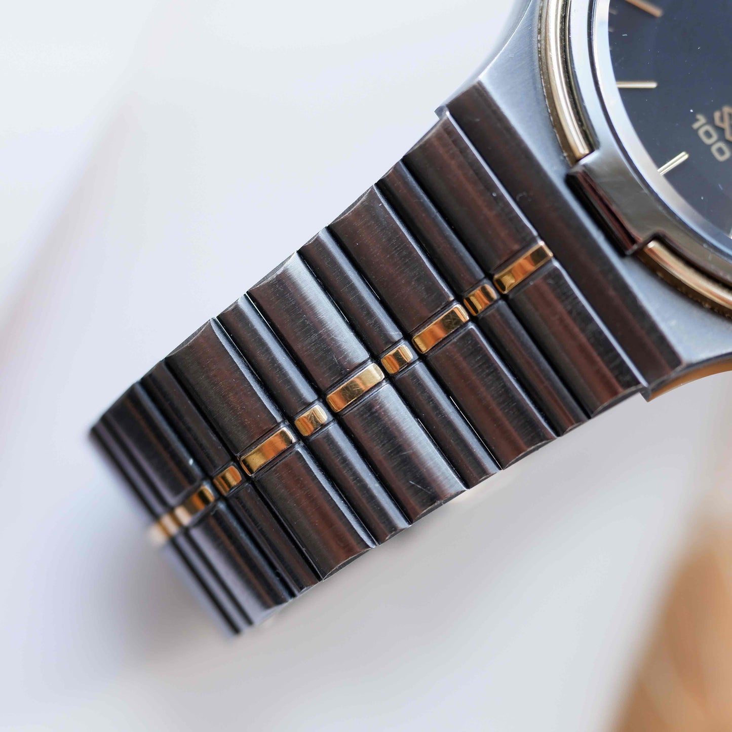 Vintage Seiko SQ100 Day and Date Quartz Black and Gold from the 80s