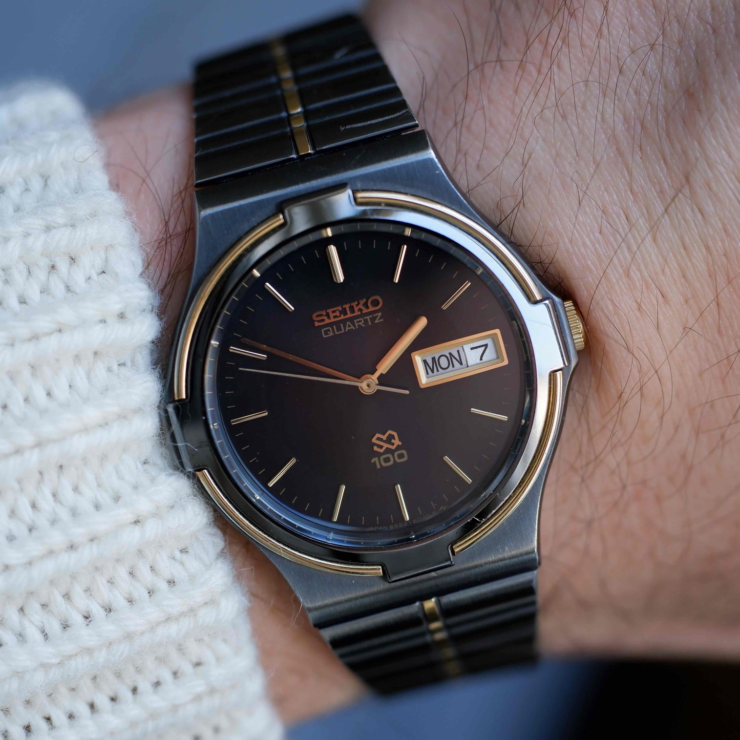 Vintage Seiko SQ100 Day and Date Quartz Black and Gold from the 80s
