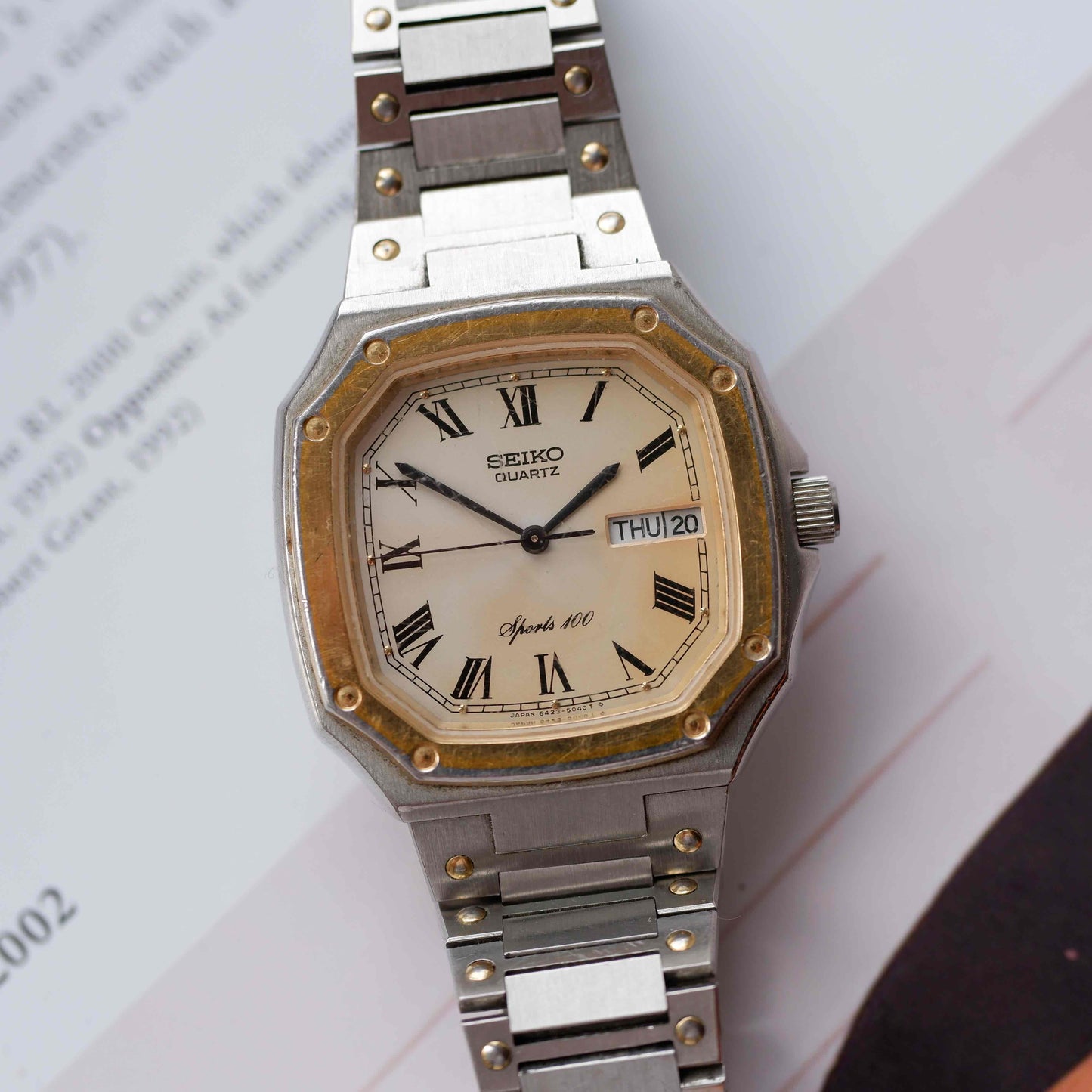 Vintage Seiko Sports 100 Ref. 6423-5030 Day and Date Quartz Two Tone from the 80s