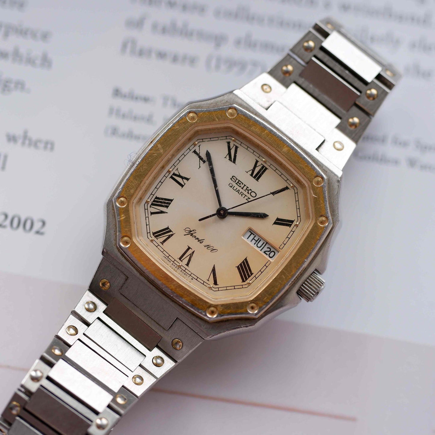 Vintage Seiko Sports 100 Ref. 6423-5030 Day and Date Quartz Two Tone from the 80s
