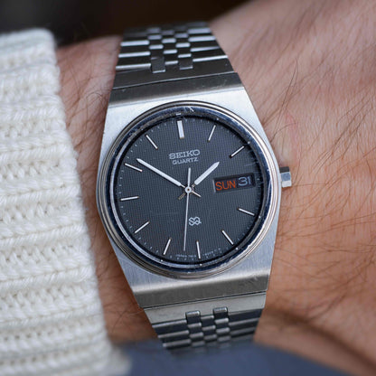 Vintage Seiko SQ Day-Date Black Waffle Dial Integrated Bracelet 80s