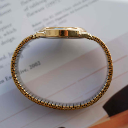 Vintage Sekonda Gold Flexi with Golden Dial Date Quartz 80s