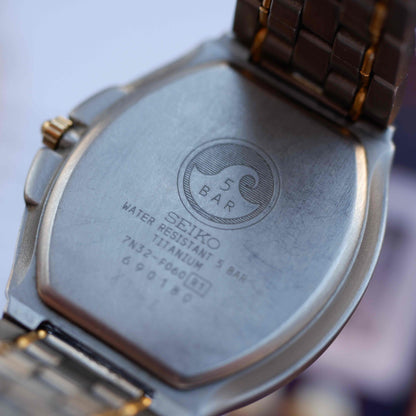 Vintage Seiko Tank Titanium SQ50 Date 90s Two-Tone White Roman Dial