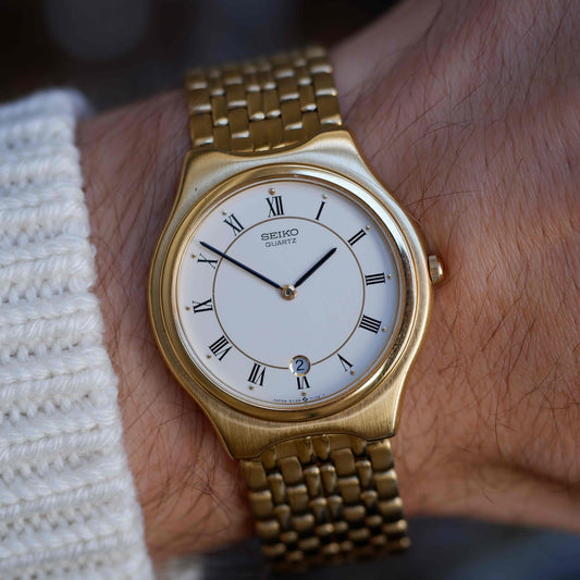 Vintage Seiko Quartz Date 90s with White Roman Dial Integrated Bracelet - MINT