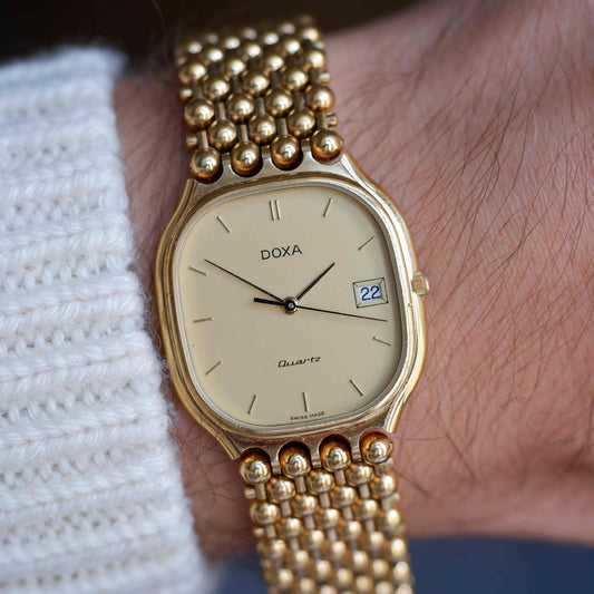 Vintage Doxa Gold Watch 80s Champagne Dial Bubble Bracelet Quartz