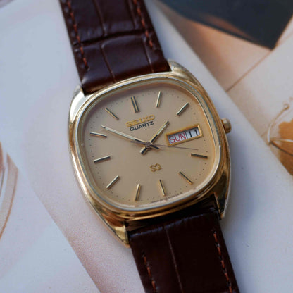 Vintage Seiko SQ Cushion Case Day-Date Quartz Gold 80s