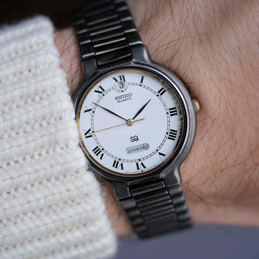 Vintage Seiko Dress Watch Black Coated White Roman Dial from the 80s