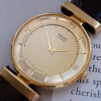 Vintage Seiko Dress Watch 80s Gold Champagne Roman Dial Mint
