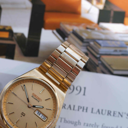 Vintage Seiko Quartz Day Date 90s with Gold Burst Dial and Roman Day
