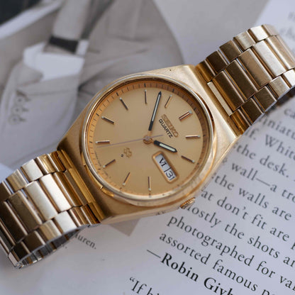 Vintage Seiko Quartz Day Date 90s with Gold Burst Dial and Roman Day