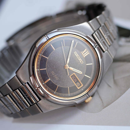 Vintage Seiko SQ100 Day-Date Black and Gold Frosted Dial 80s