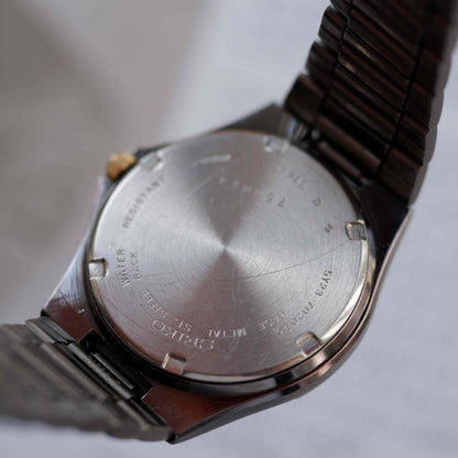 Vintage Seiko SQ100 Day-Date Black and Gold Frosted Dial 80s