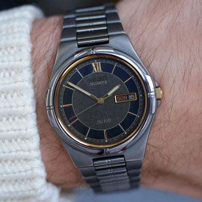 Vintage Seiko SQ100 Day-Date Black and Gold Frosted Dial 80s