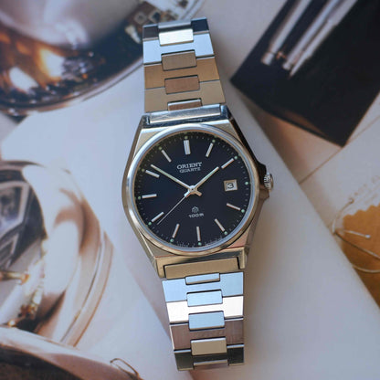 Vintage Orient 80s Charcoal Black Dial Date with Integrated Bracelet