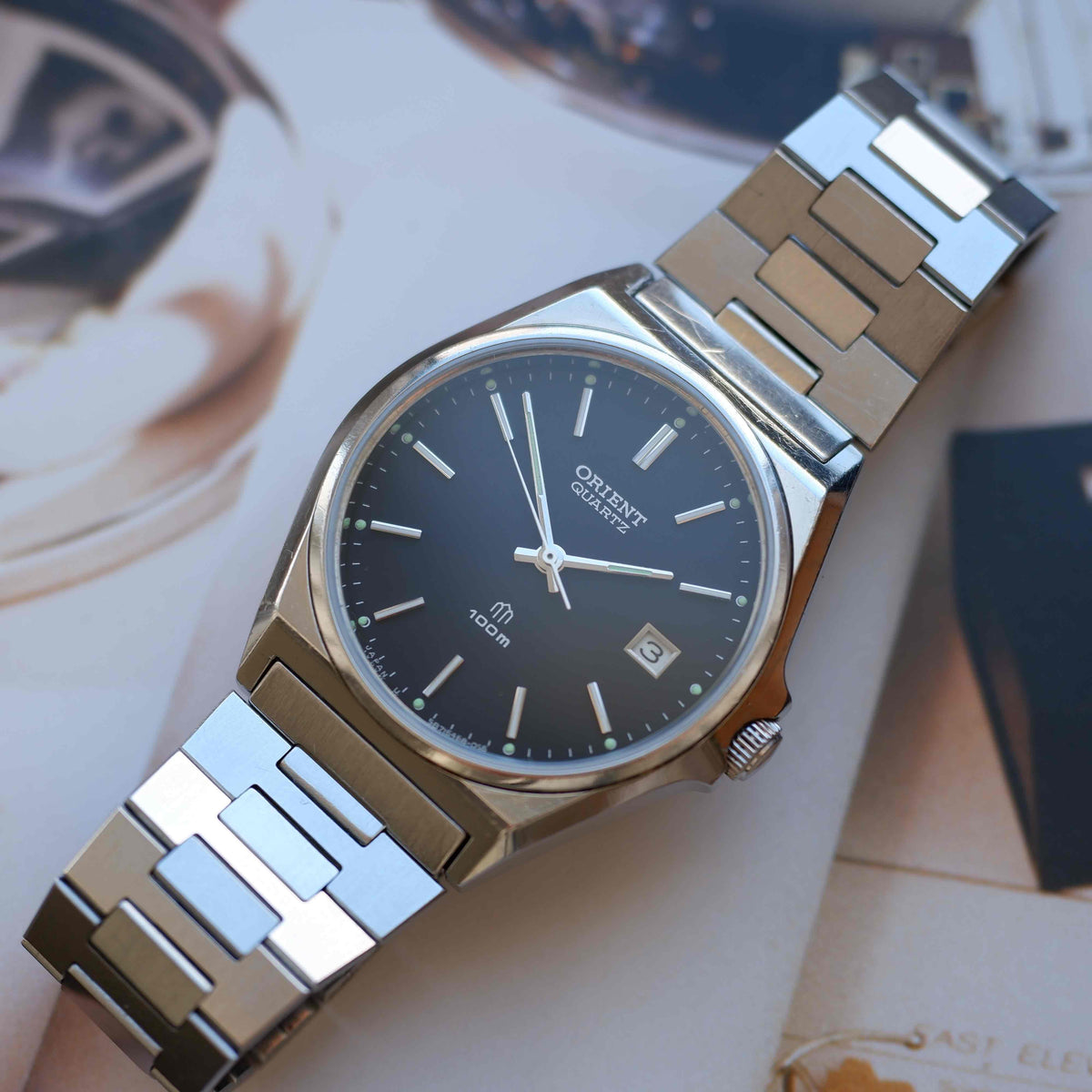 Vintage Orient 80s Charcoal Black Dial Date with Integrated Bracelet