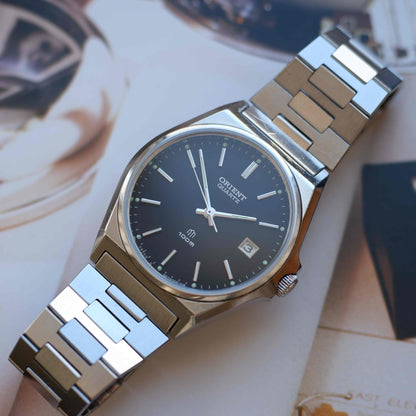 Vintage Orient 80s Charcoal Black Dial Date with Integrated Bracelet