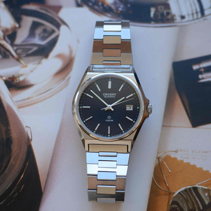 Vintage Orient 80s Charcoal Black Dial Date with Integrated Bracelet