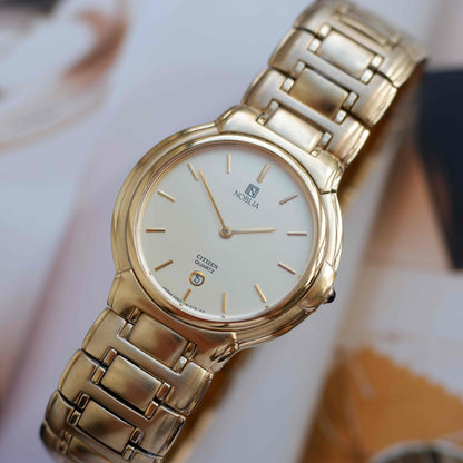 Vintage Citizen Noblia Date Quartz 80s Slim Case Champagne Dial NOS