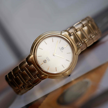 Vintage Citizen Noblia Date Quartz 80s Slim Case Champagne Dial NOS