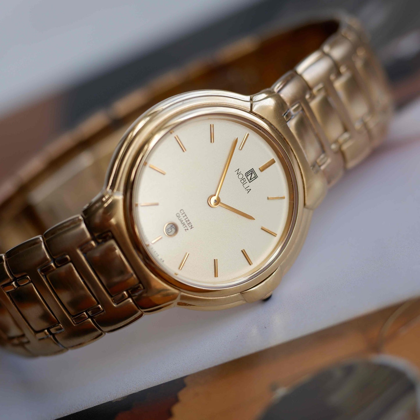 Vintage Citizen Noblia Date Quartz 80s Slim Case Champagne Dial NOS