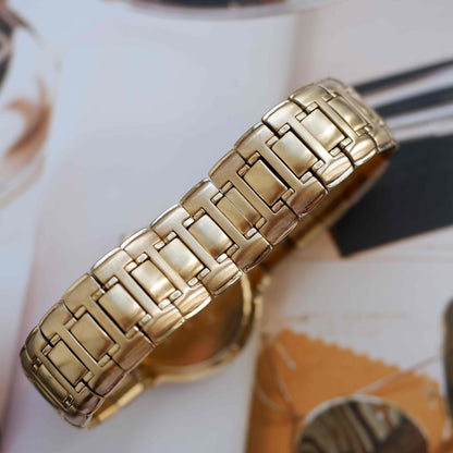 Vintage Citizen Noblia Date Quartz 80s Slim Case Champagne Dial NOS