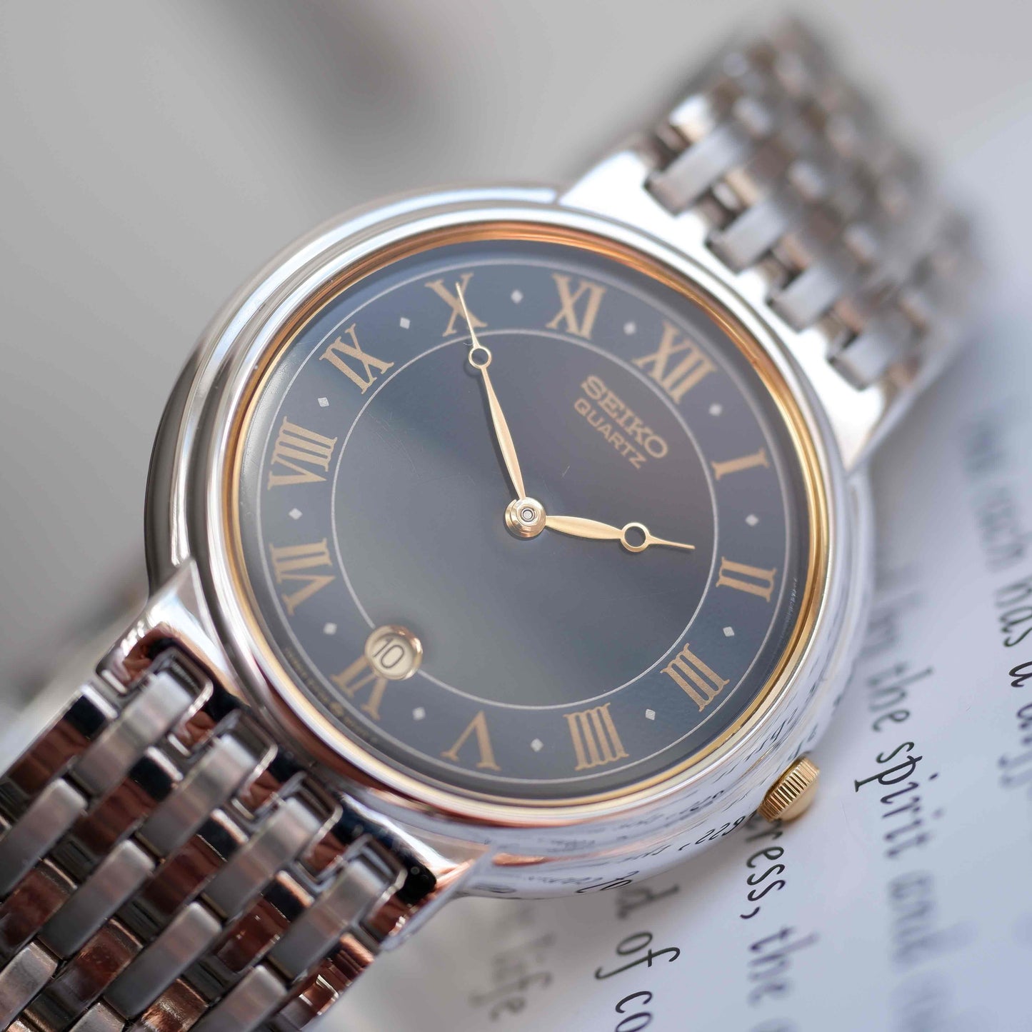 Vintage Seiko Quartz Blue Roman Dial Watch Gold Accents 90s Classic NOS