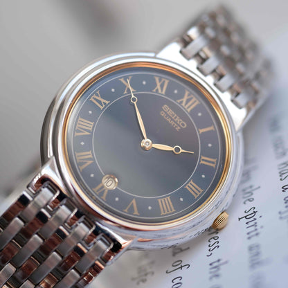 Vintage Seiko Quartz Blue Roman Dial Watch Gold Accents 90s Classic NOS