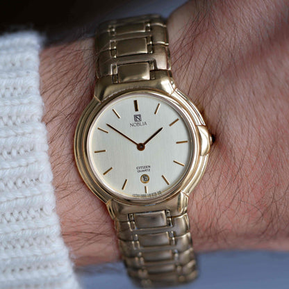 Vintage Citizen Noblia Date Quartz 80s Slim Case Champagne Dial NOS