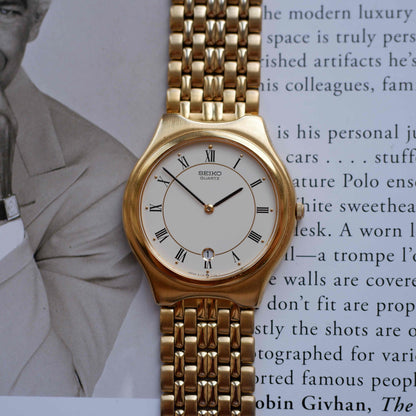Vintage Seiko Quartz Date 90s with White Roman Dial Integrated Bracelet - MINT