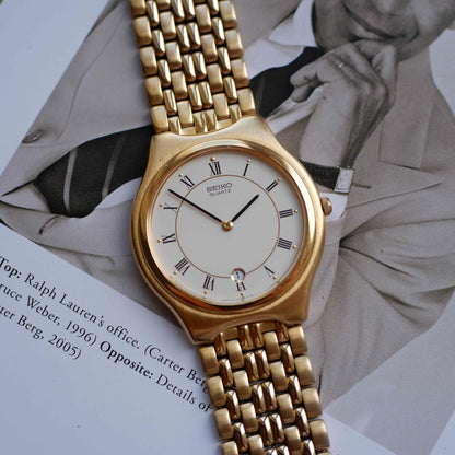Vintage Seiko Quartz Date 90s with White Roman Dial Integrated Bracelet - MINT