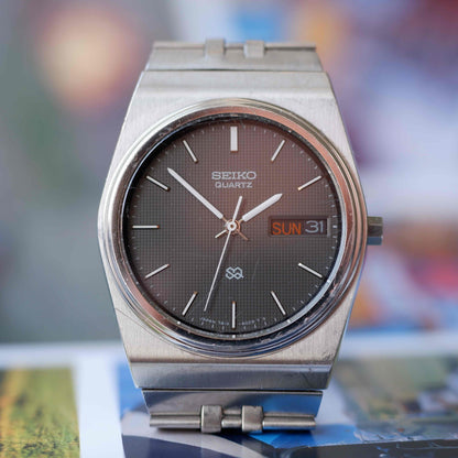 Vintage Seiko SQ Day-Date Black Waffle Dial Integrated Bracelet 80s