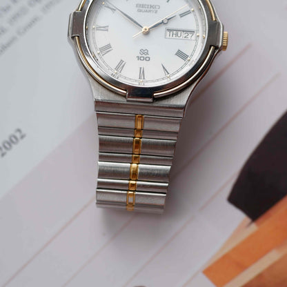 Vintage Seiko SQ100 Day and Date Quartz Two Tone Gold from the 80s