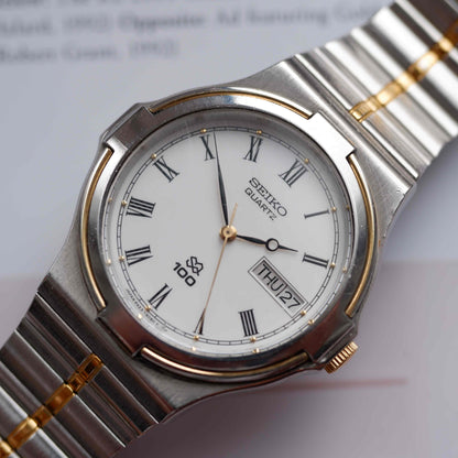 Vintage Seiko SQ100 Day and Date Quartz Two Tone Gold from the 80s