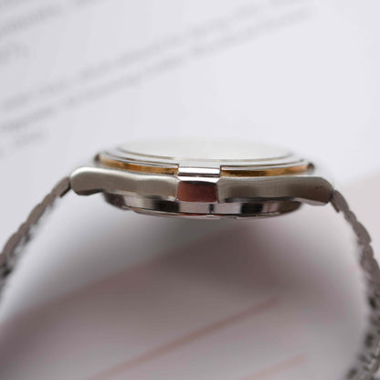 Vintage Seiko SQ100 Day and Date Quartz Two Tone Gold from the 80s