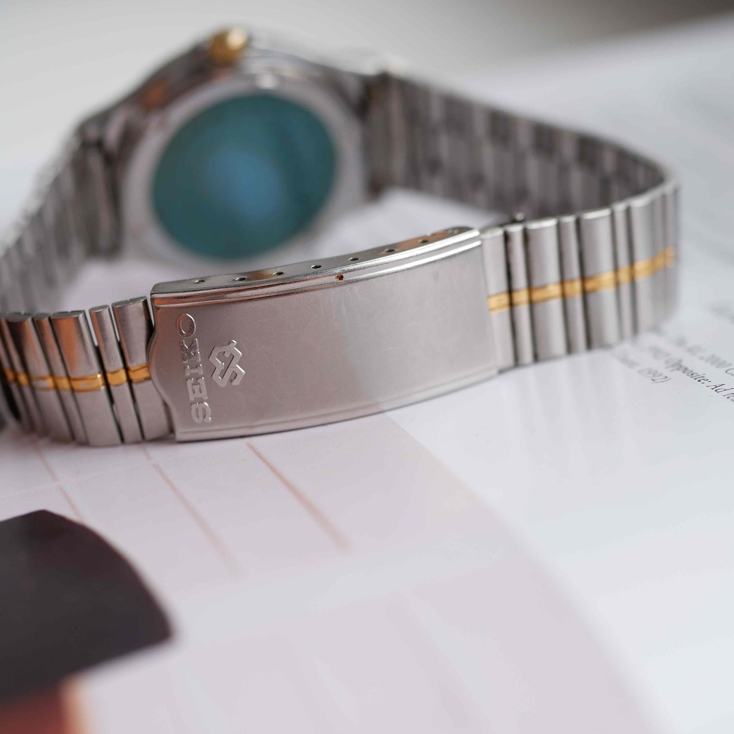 Vintage Seiko SQ100 Day and Date Quartz Two Tone Gold from the 80s