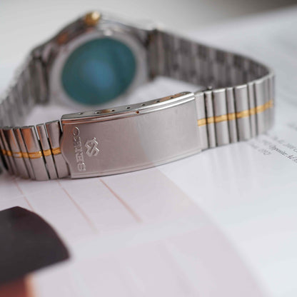 Vintage Seiko SQ100 Day and Date Quartz Two Tone Gold from the 80s