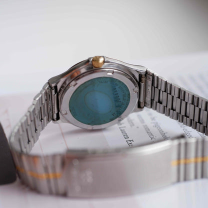 Vintage Seiko SQ100 Day and Date Quartz Two Tone Gold from the 80s