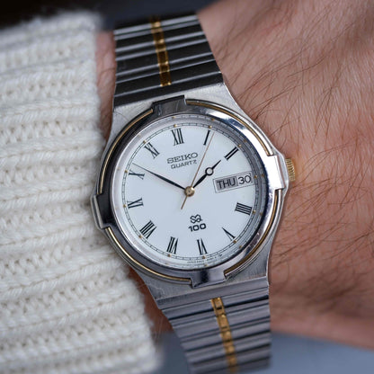 Vintage Seiko SQ100 Day and Date Quartz Two Tone Gold from the 80s
